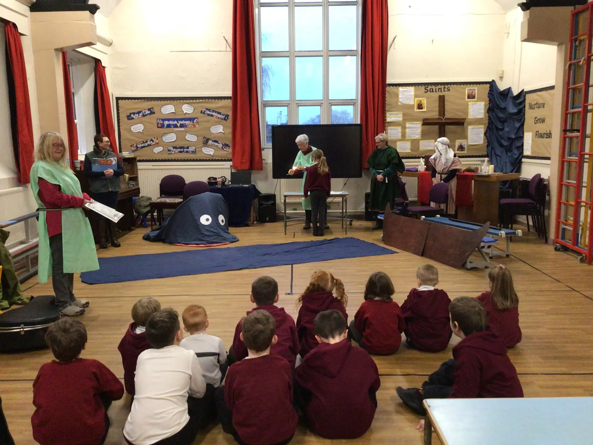Children enjoying collective worship.