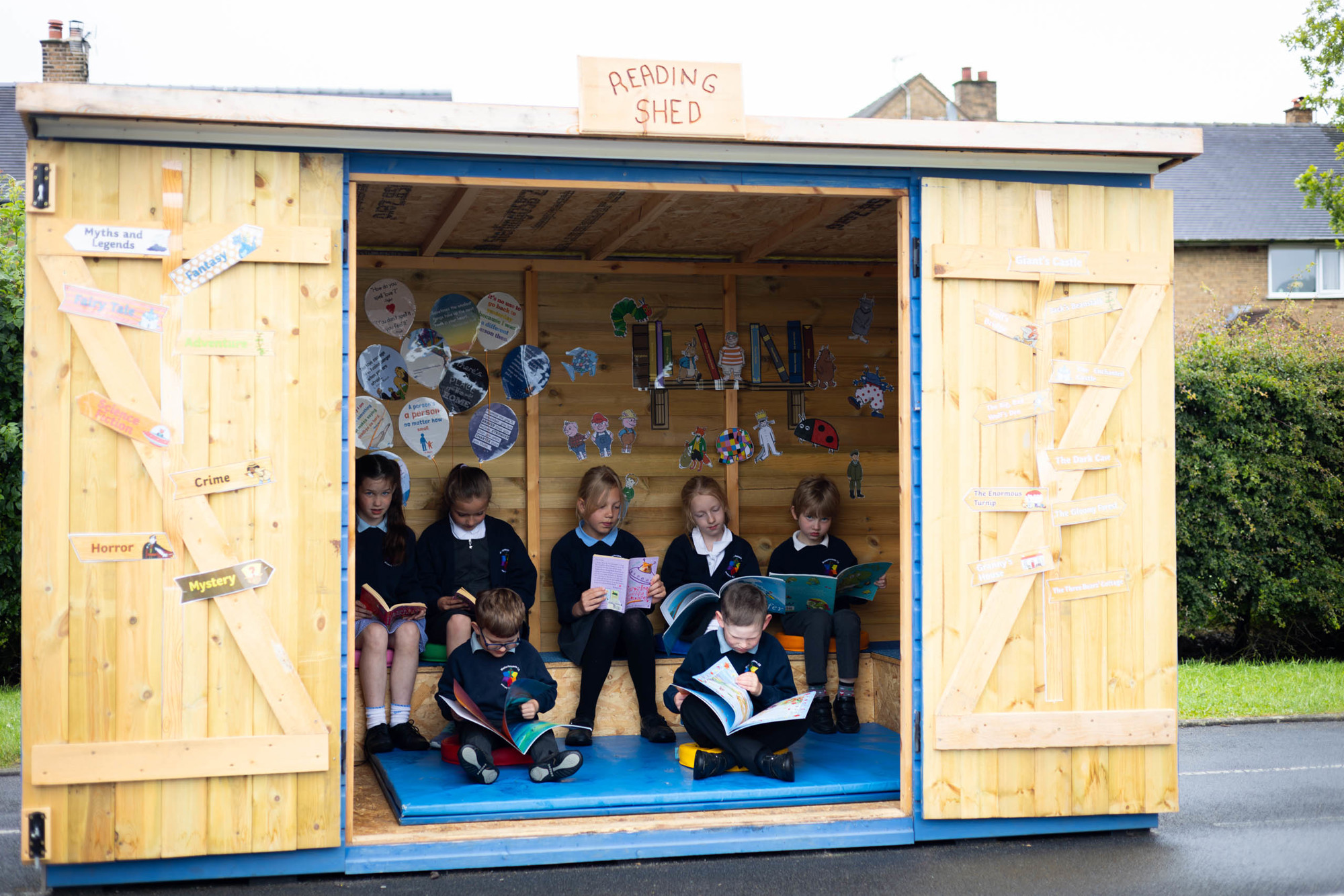 Children using the school's Reading Shed