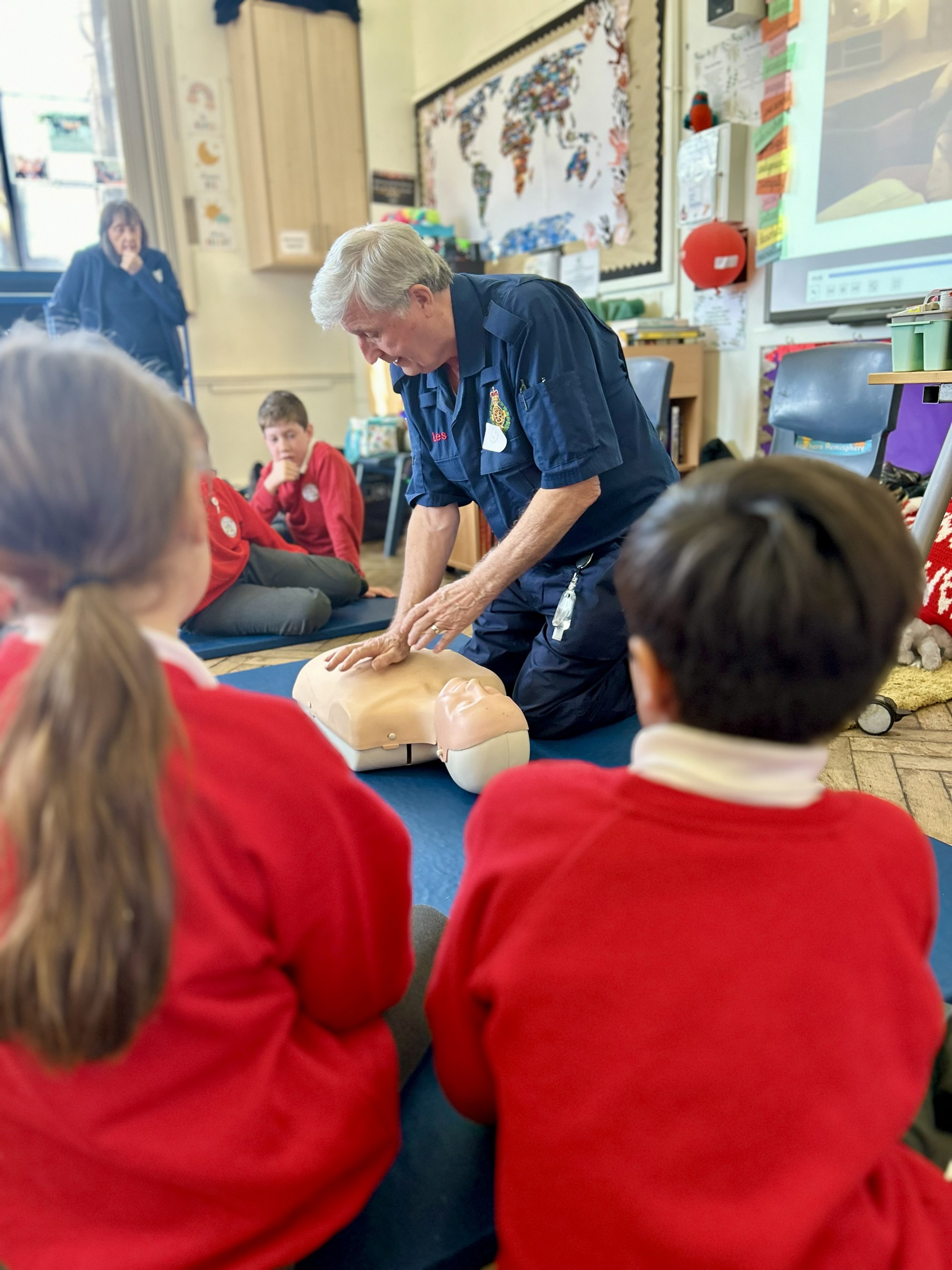 Children learning how to save a life.