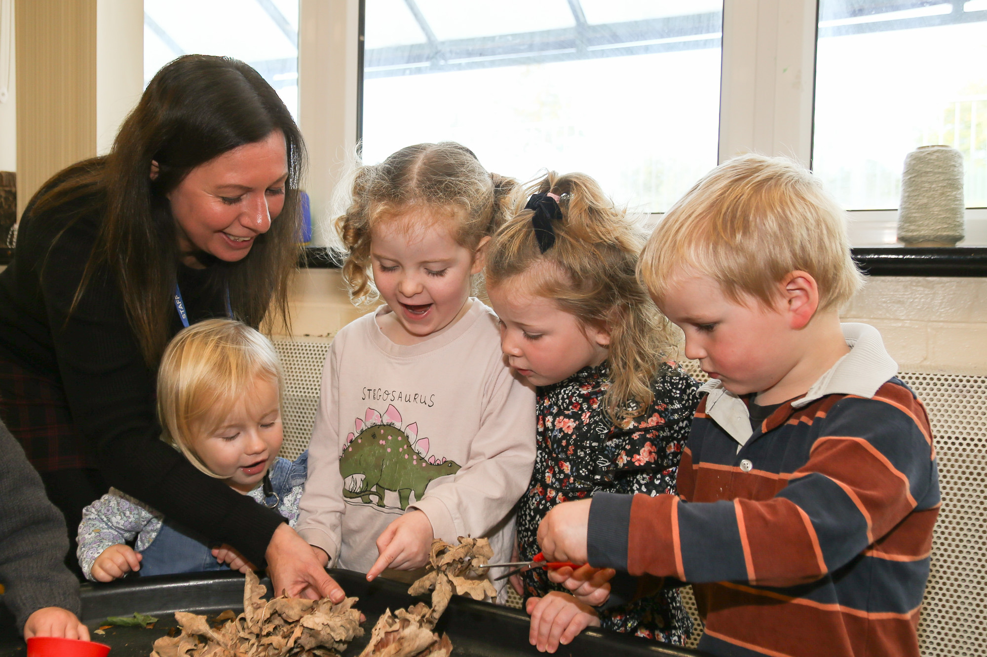 Younger children learning together.