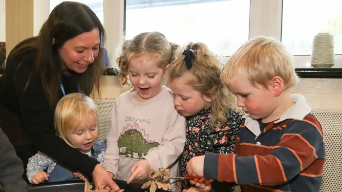 Younger children learning together.
