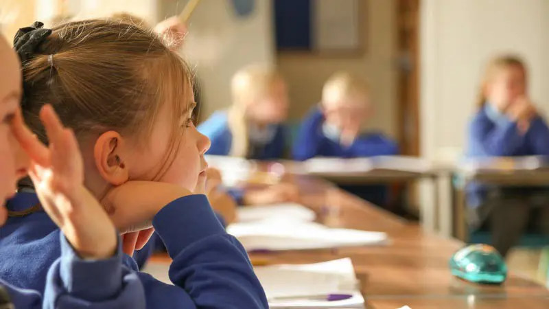 Child listening in class.