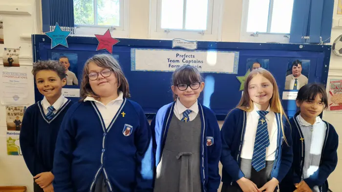 Five pupils representing the school Worship Council