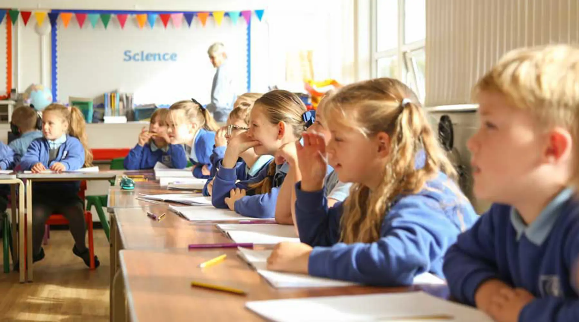 Children listening and learning in class.