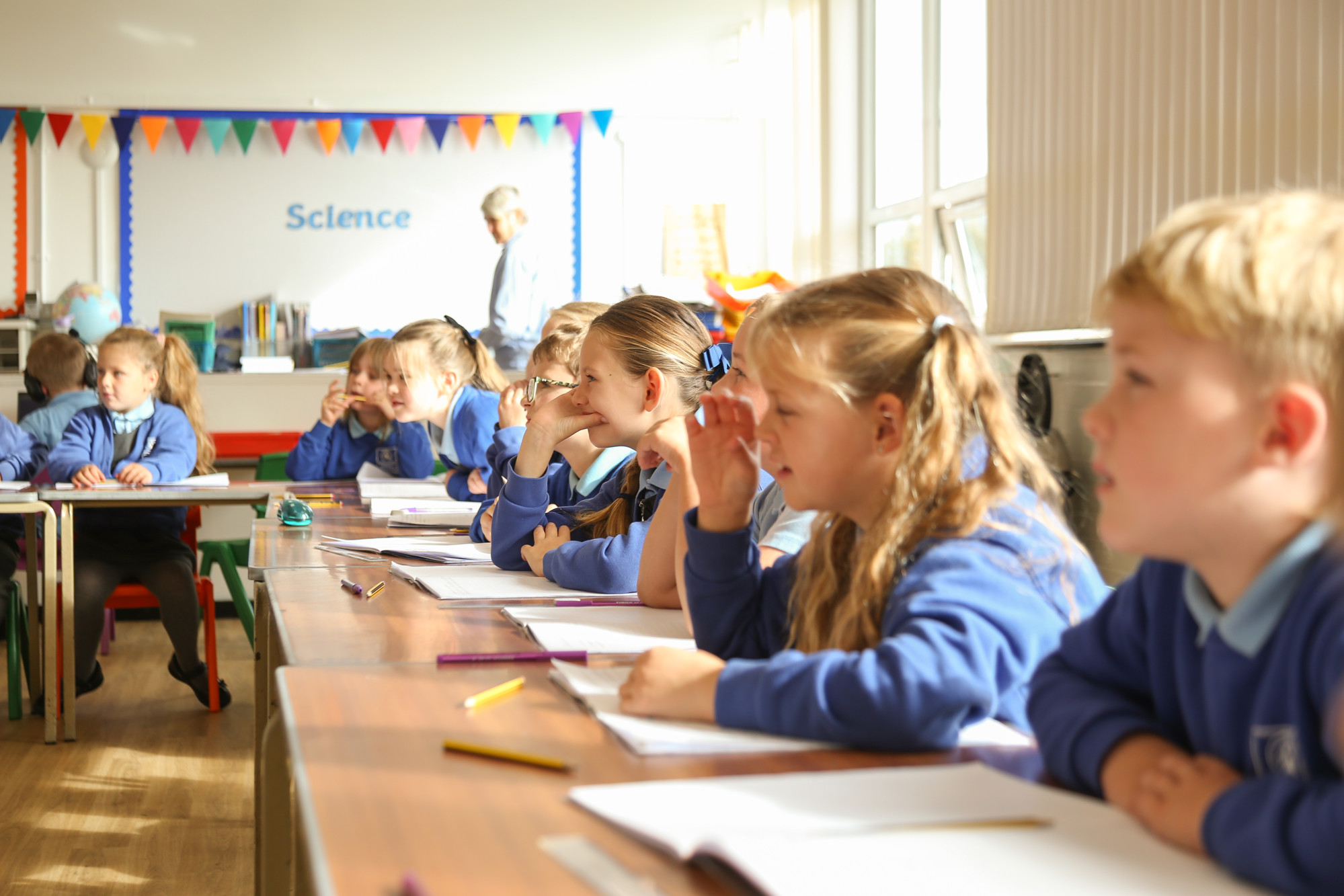 Children learning together in class.