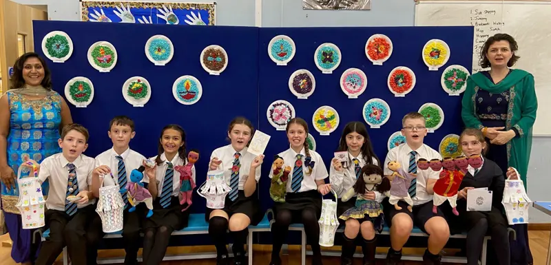 Children celebrating Rangoli art