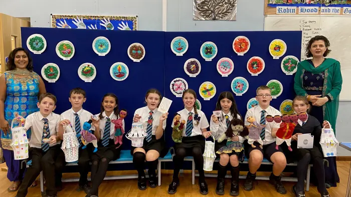 Children celebrating Rangoli art