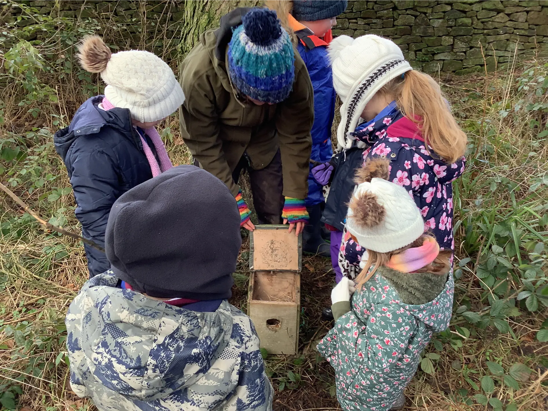 Children learning during a forest school session.