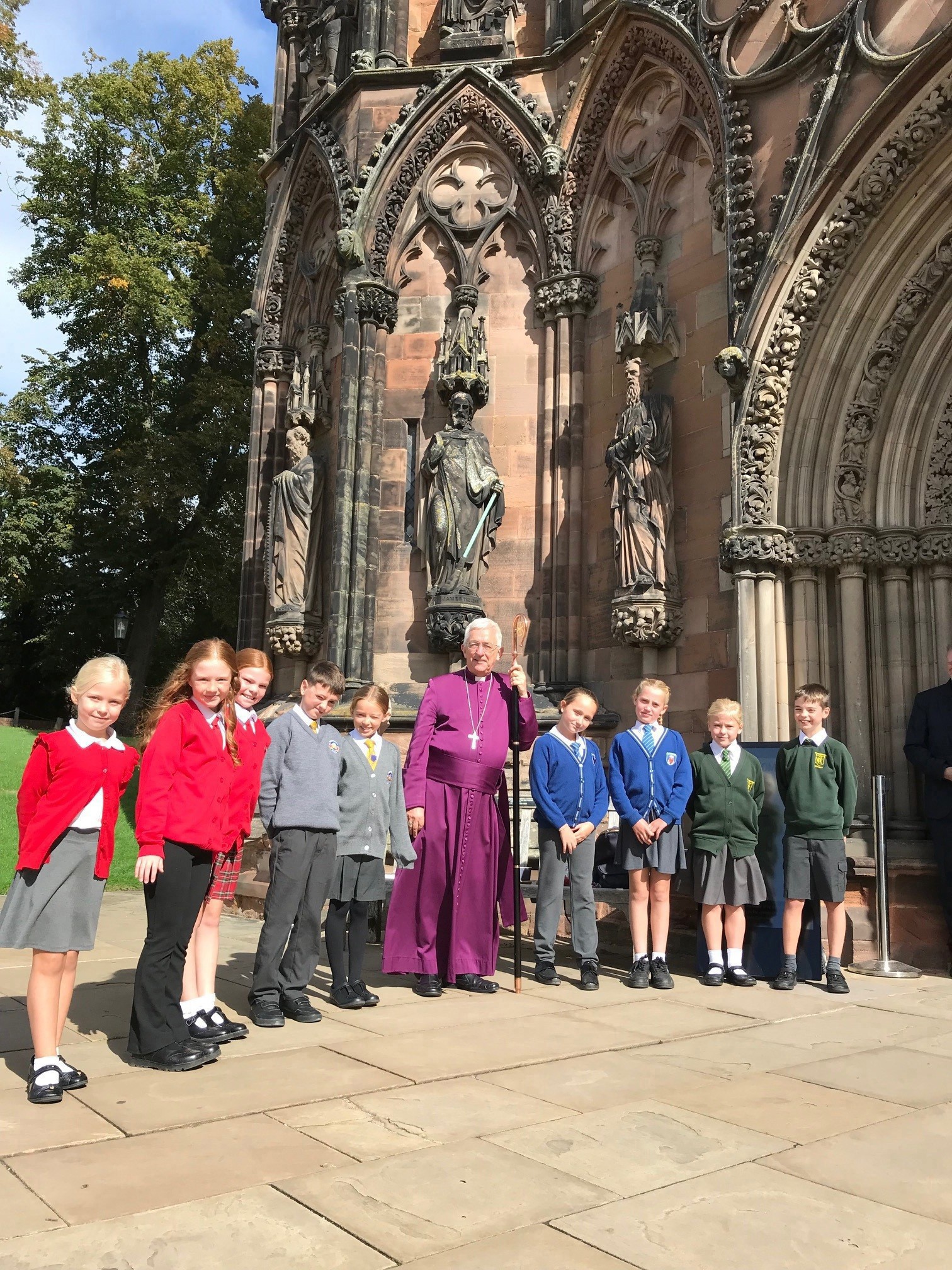 Children from five Trust schools with the Bishop of Lichfield.