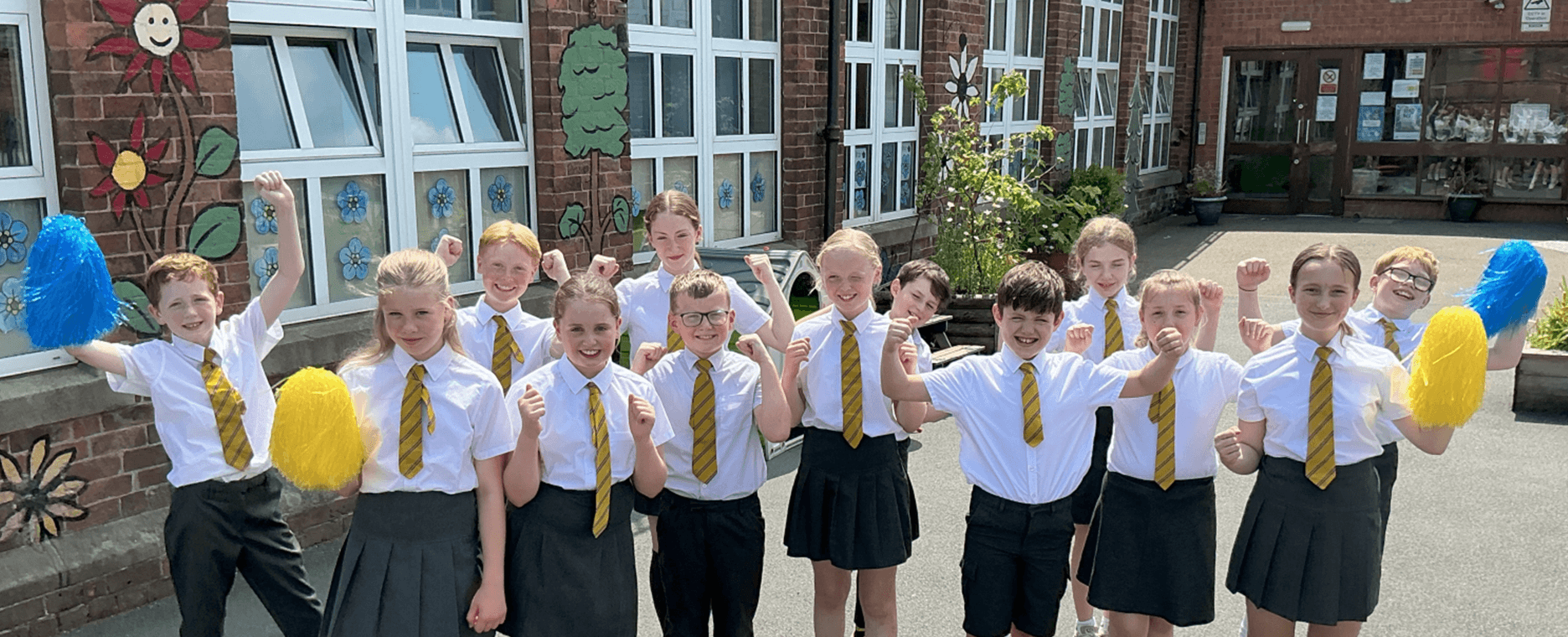 Group of children celebrating school's success