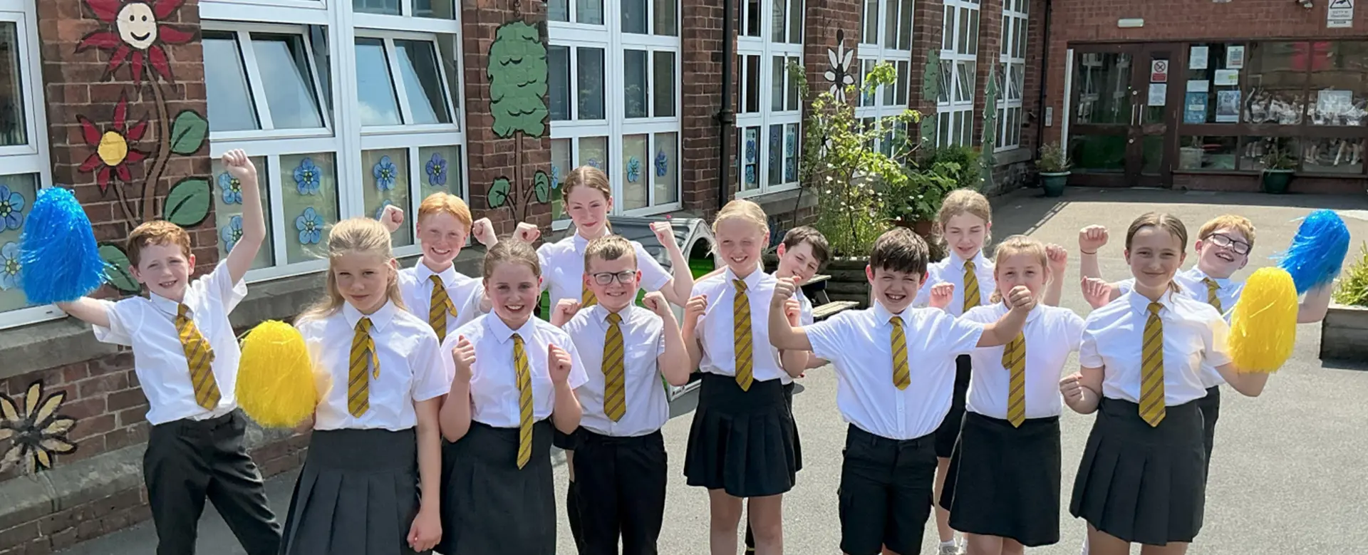 Group of children celebrating school's success