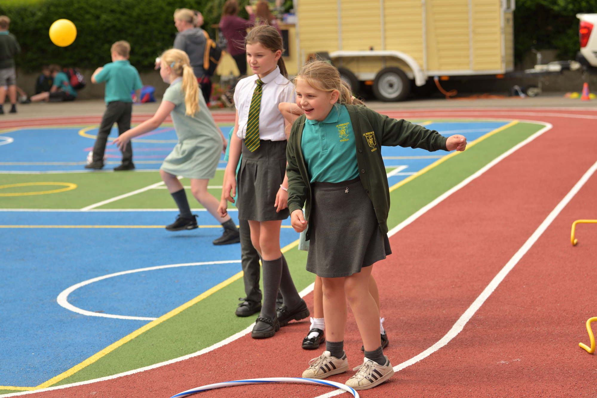 Children playing on playground track