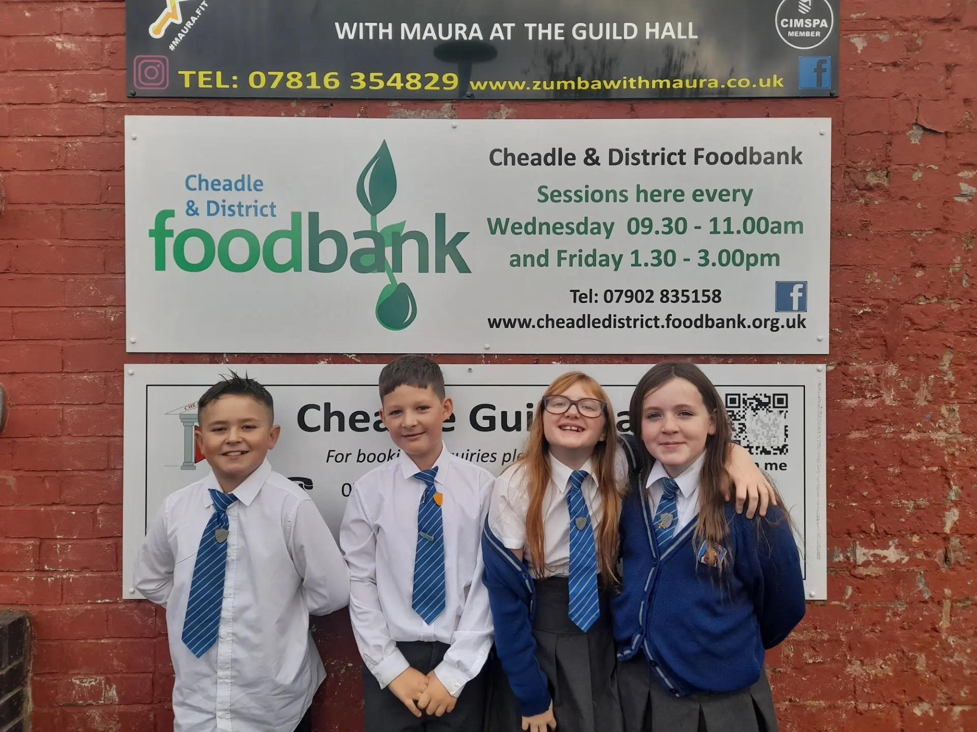 Four pupils visiting the local foodbank.