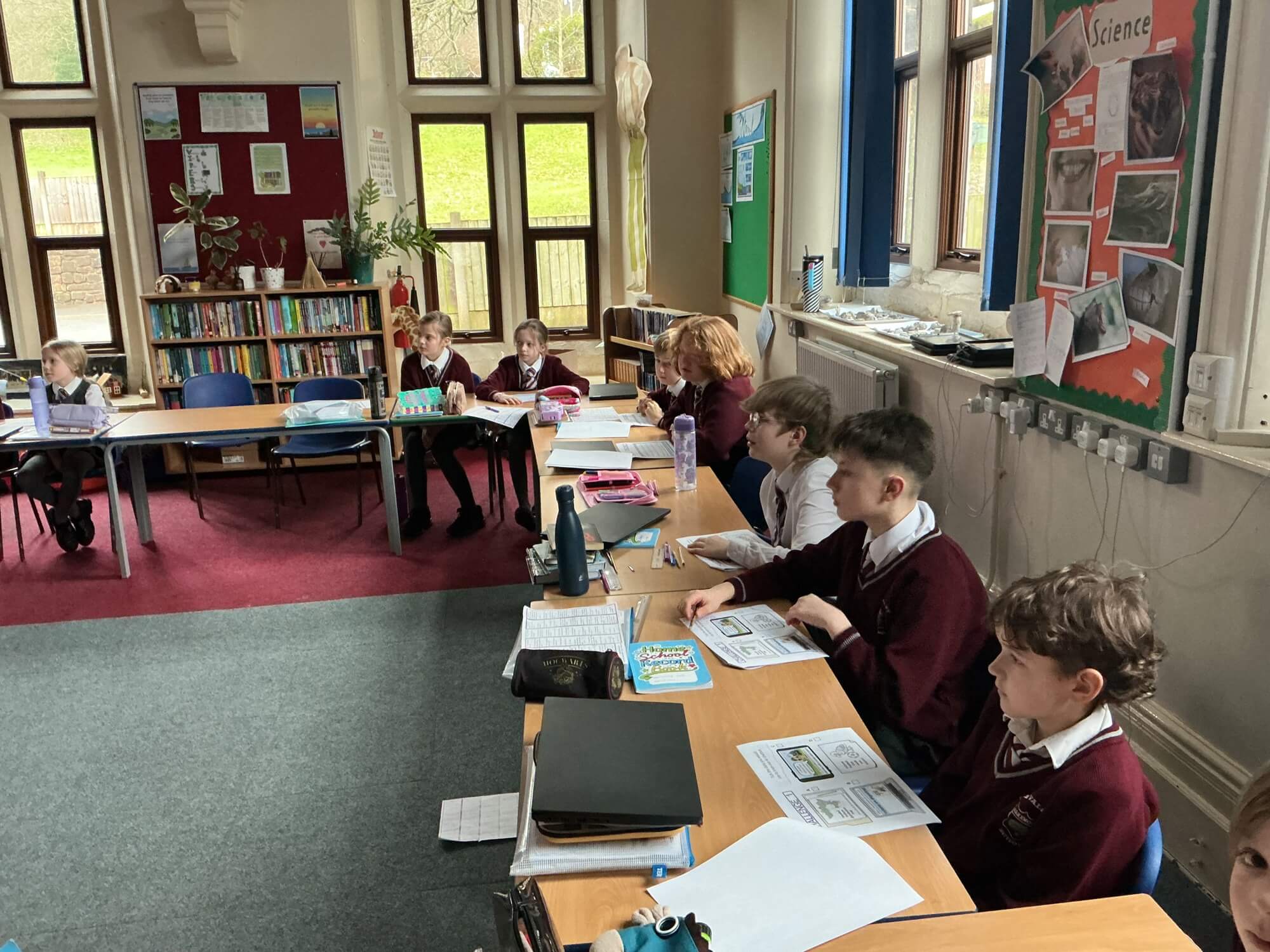 Children learning together in class